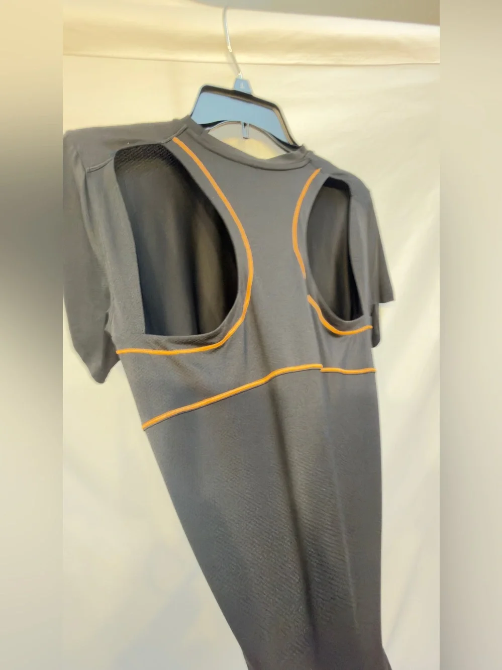 Lululemon Ventilated Open-Back Training T-Shirt in Black with Orange Soda trim